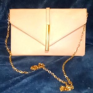 Cream colored clutch purse